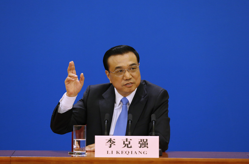 3月15日，國務院總理李克強在北京人民大會堂與中外記者見面，并回答記者提問。 新華社記者 沈伯韓 攝